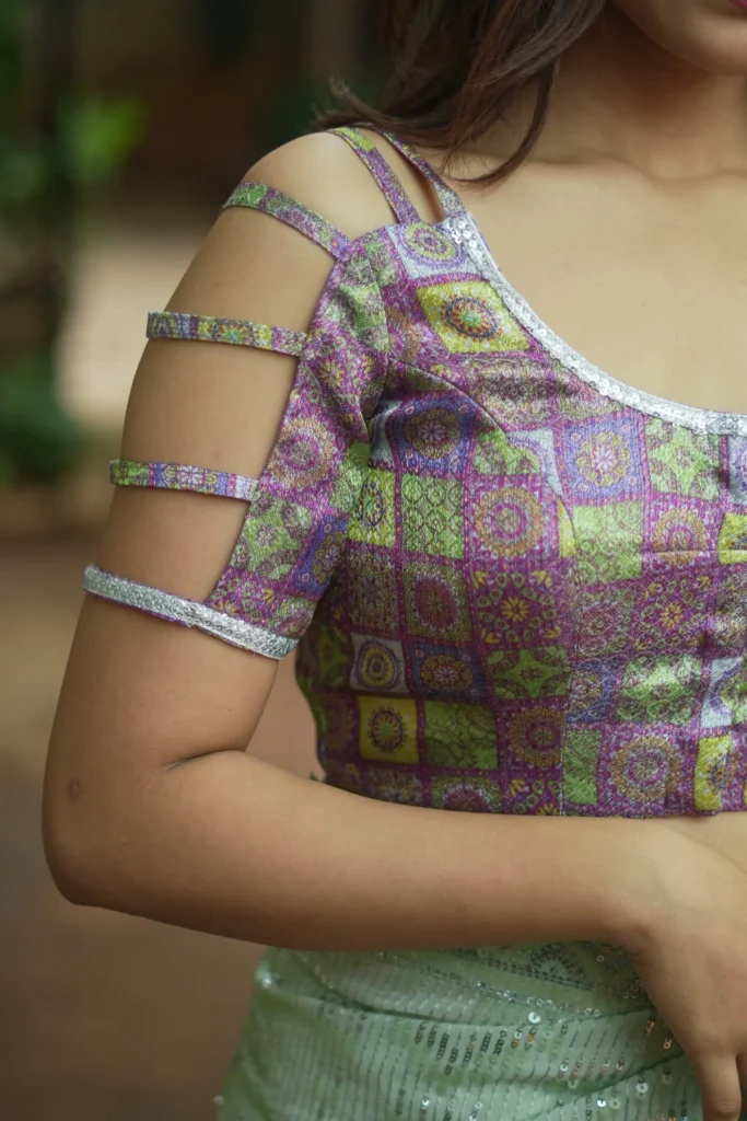 Multicolor Printed Blouse on Lavender Base with Multi-Strapped Sleeves
