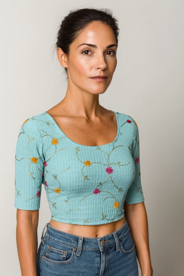 Cotton lycra embroidered stretchable readymade blouse with floral design in multiple colors.